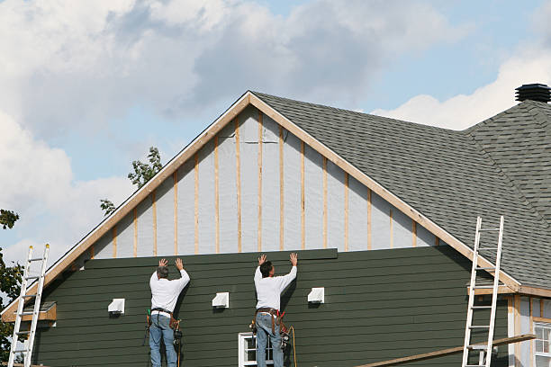 Professional Vinyl Siding technician working in Reading, PA